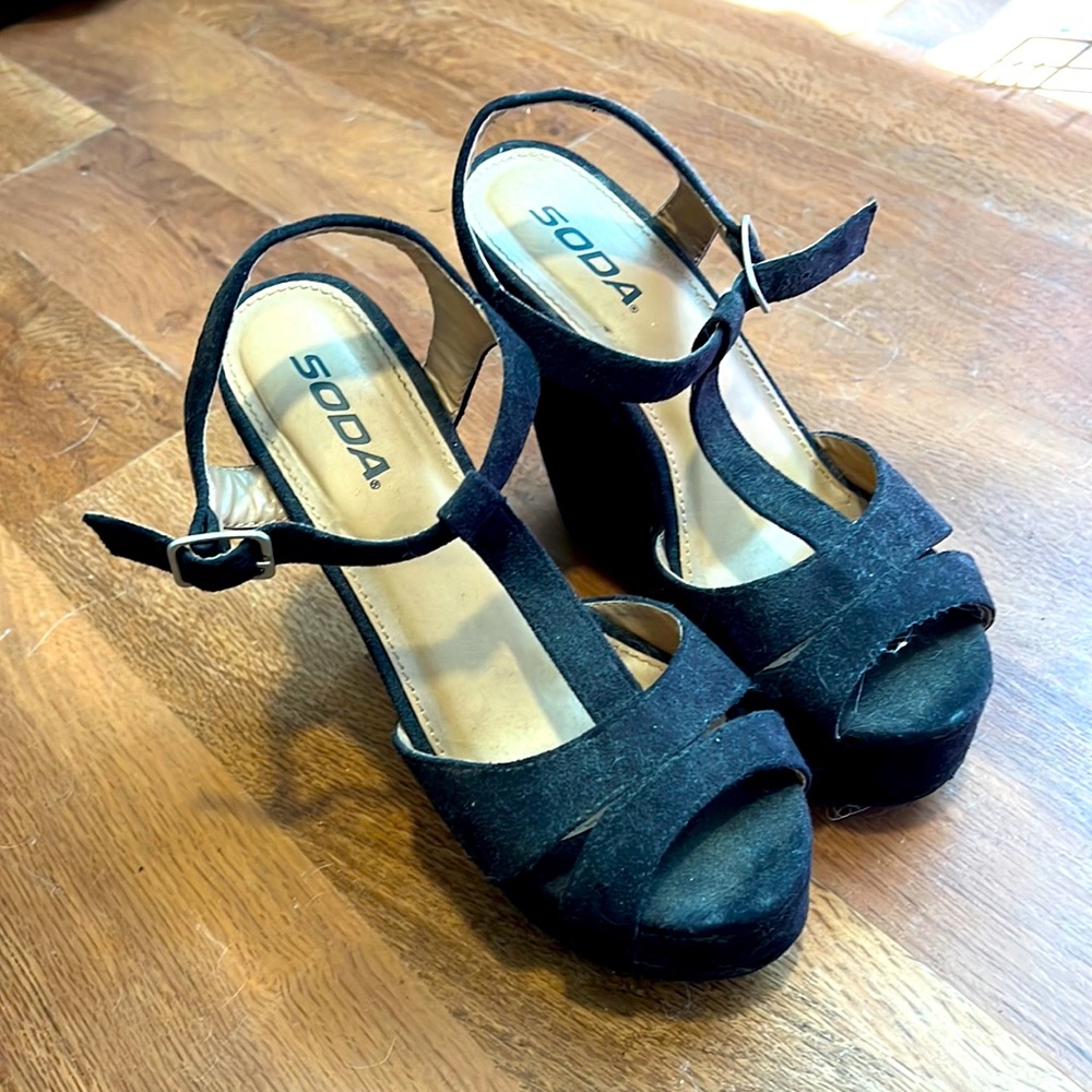 Black suede wedges.